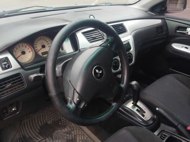 Сірий Міцубісі Lancer, об'ємом двигуна 2 л та пробігом 330 тис. км за 3450 $, фото 4 на Automoto.ua