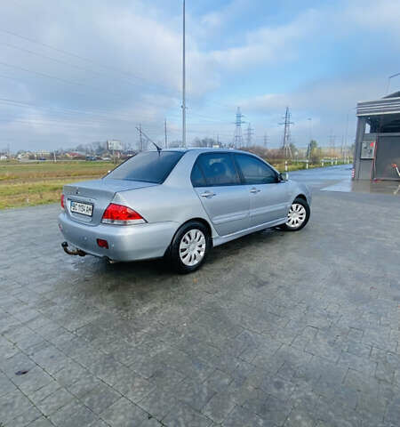 Серый Мицубиси Лансер, объемом двигателя 1.6 л и пробегом 253 тыс. км за 2850 $, фото 6 на Automoto.ua