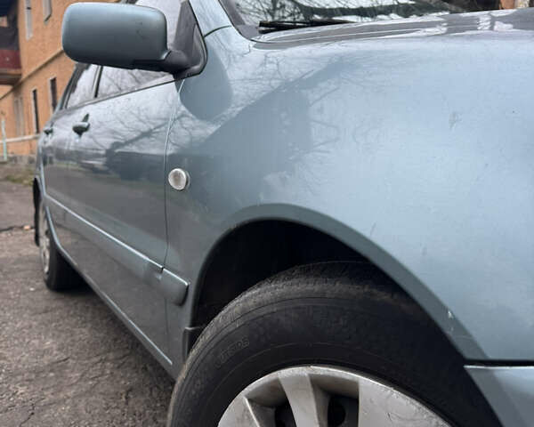 Сірий Міцубісі Lancer, об'ємом двигуна 1.6 л та пробігом 240 тис. км за 3000 $, фото 9 на Automoto.ua