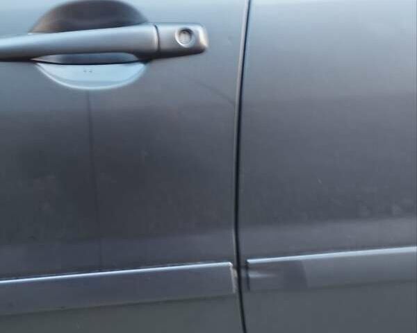 Сірий Міцубісі Lancer, об'ємом двигуна 1.58 л та пробігом 217 тис. км за 3500 $, фото 10 на Automoto.ua