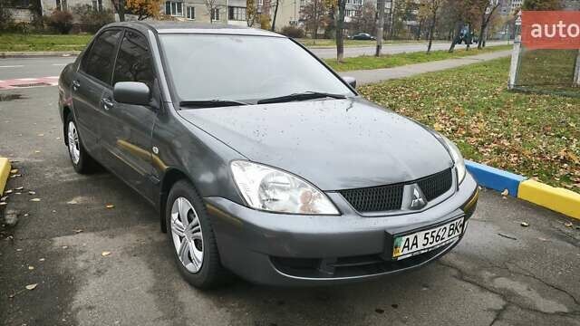 Серый Мицубиси Лансер, объемом двигателя 1.6 л и пробегом 263 тыс. км за 3800 $, фото 5 на Automoto.ua