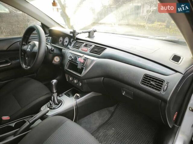 Серый Мицубиси Лансер, объемом двигателя 1.6 л и пробегом 234 тыс. км за 4300 $, фото 6 на Automoto.ua
