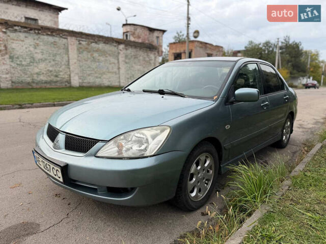 Серый Мицубиси Лансер, объемом двигателя 1.58 л и пробегом 260 тыс. км за 4050 $, фото 5 на Automoto.ua