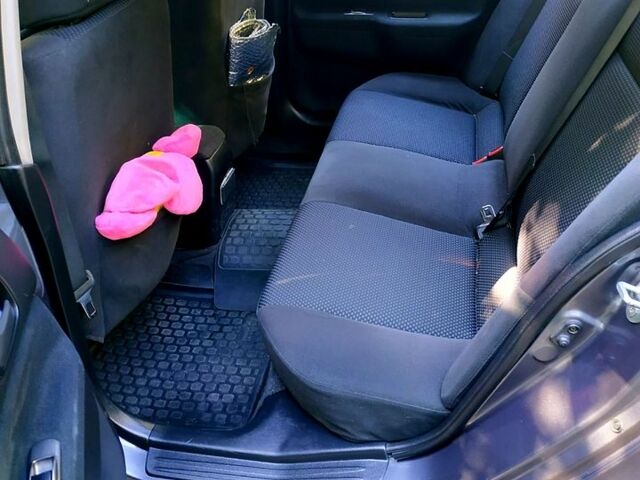 Серый Мицубиси Лансер, объемом двигателя 1.6 л и пробегом 177 тыс. км за 4000 $, фото 5 на Automoto.ua