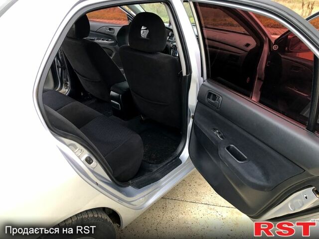 Серый Мицубиси Лансер, объемом двигателя 1.6 л и пробегом 0 тыс. км за 4000 $, фото 9 на Automoto.ua