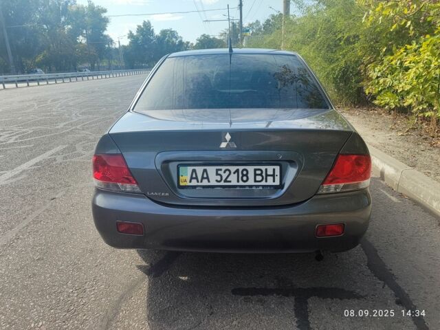 Сірий Міцубісі Lancer, об'ємом двигуна 1.6 л та пробігом 240 тис. км за 4400 $, фото 3 на Automoto.ua