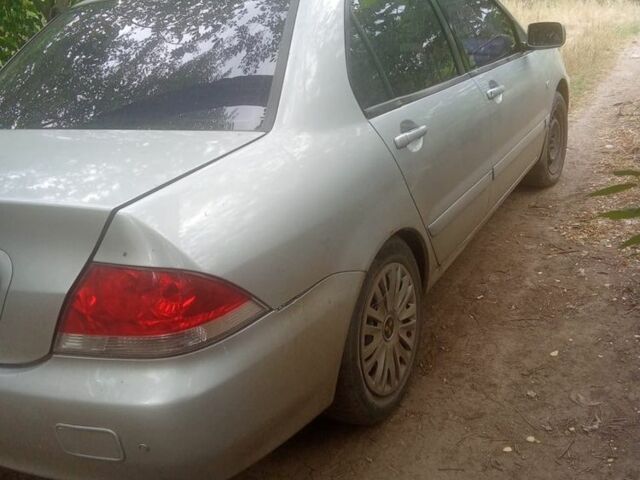 Сірий Міцубісі Lancer, об'ємом двигуна 1.6 л та пробігом 3 тис. км за 3200 $, фото 4 на Automoto.ua