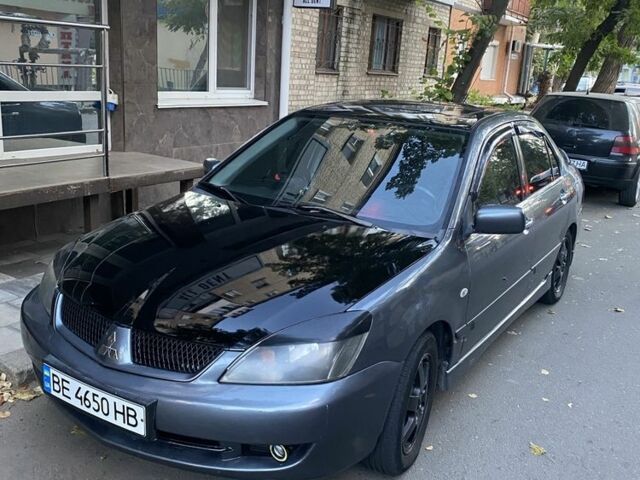Сірий Міцубісі Lancer, об'ємом двигуна 1.6 л та пробігом 2 тис. км за 4750 $, фото 4 на Automoto.ua