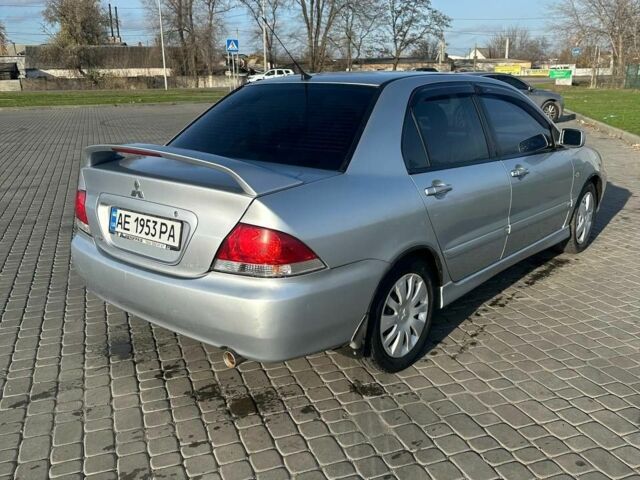 Серый Мицубиси Лансер, объемом двигателя 1.6 л и пробегом 170 тыс. км за 3700 $, фото 3 на Automoto.ua