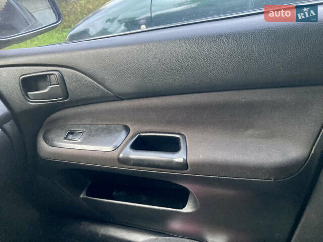 Сірий Міцубісі Lancer, об'ємом двигуна 1.6 л та пробігом 222 тис. км за 4900 $, фото 10 на Automoto.ua