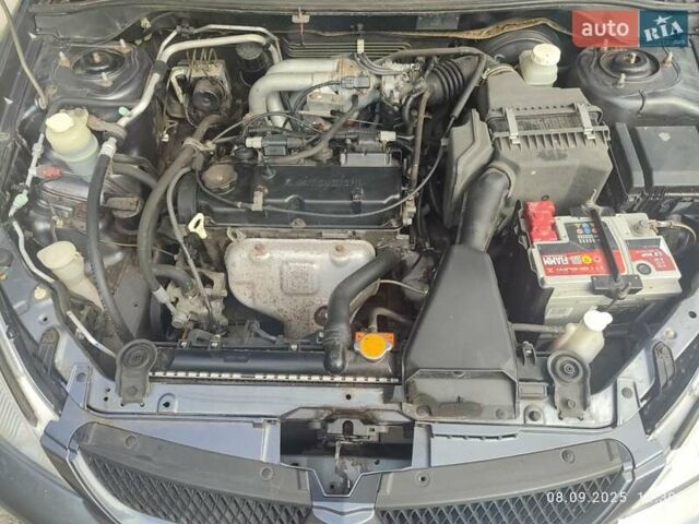 Сірий Міцубісі Lancer, об'ємом двигуна 1.6 л та пробігом 242 тис. км за 4900 $, фото 40 на Automoto.ua