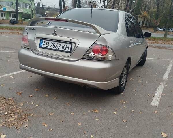 Сірий Міцубісі Lancer, об'ємом двигуна 2 л та пробігом 330 тис. км за 3450 $, фото 1 на Automoto.ua
