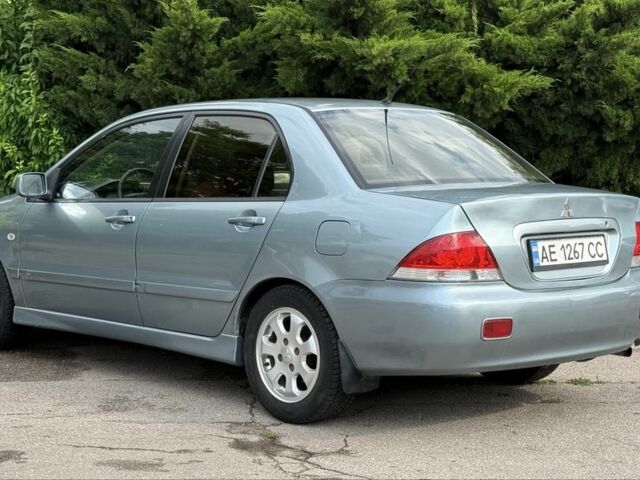 Серый Мицубиси Лансер, объемом двигателя 1.6 л и пробегом 220 тыс. км за 4400 $, фото 14 на Automoto.ua