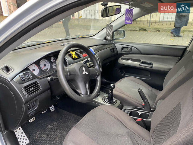 Серый Мицубиси Лансер, объемом двигателя 1.6 л и пробегом 444 тыс. км за 3400 $, фото 15 на Automoto.ua
