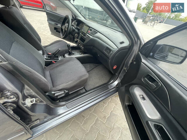 Сірий Міцубісі Lancer, об'ємом двигуна 1.58 л та пробігом 162 тис. км за 4650 $, фото 12 на Automoto.ua