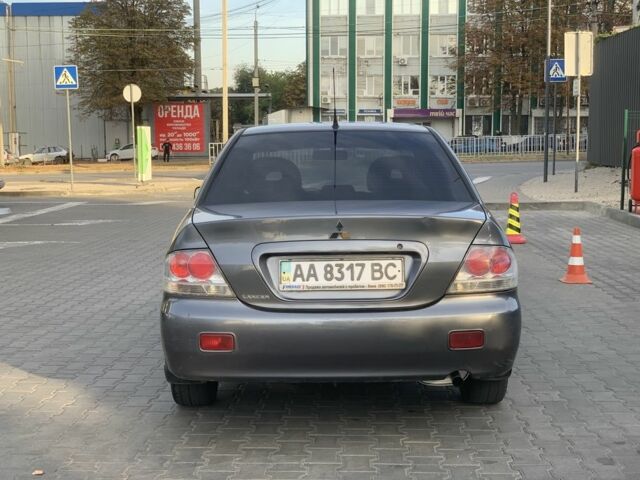 Сірий Міцубісі Lancer, об'ємом двигуна 1.6 л та пробігом 270 тис. км за 3800 $, фото 3 на Automoto.ua