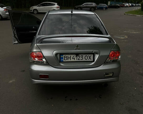 Сірий Міцубісі Lancer, об'ємом двигуна 2 л та пробігом 229 тис. км за 3800 $, фото 18 на Automoto.ua