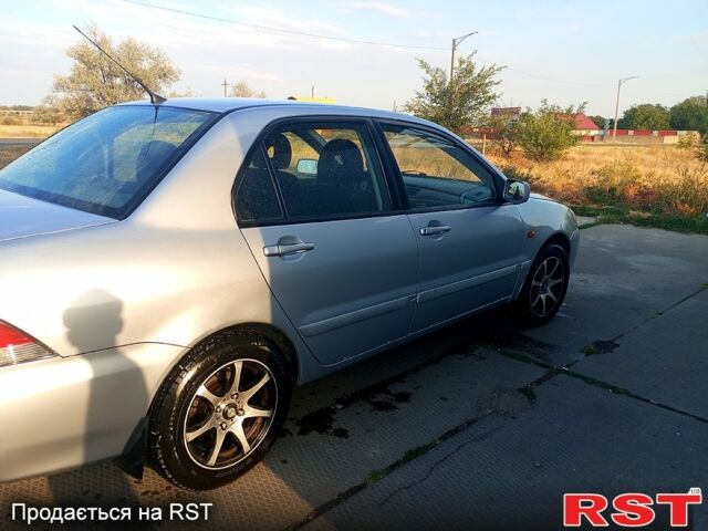 Сірий Міцубісі Lancer, об'ємом двигуна 1.6 л та пробігом 36 тис. км за 3500 $, фото 7 на Automoto.ua