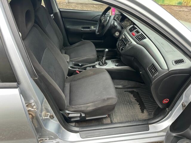 Сірий Міцубісі Lancer, об'ємом двигуна 1.6 л та пробігом 270 тис. км за 2900 $, фото 15 на Automoto.ua
