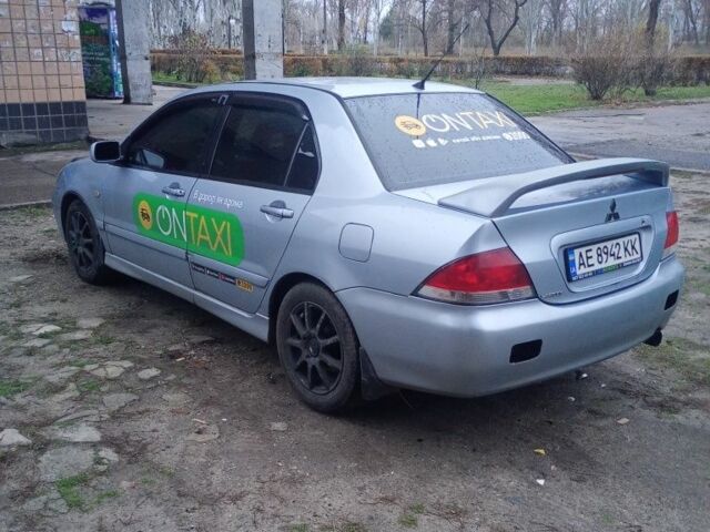 Сірий Міцубісі Lancer, об'ємом двигуна 1.6 л та пробігом 264 тис. км за 3200 $, фото 3 на Automoto.ua