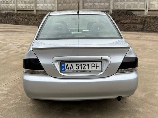 Сірий Міцубісі Lancer, об'ємом двигуна 1.6 л та пробігом 220 тис. км за 2450 $, фото 4 на Automoto.ua