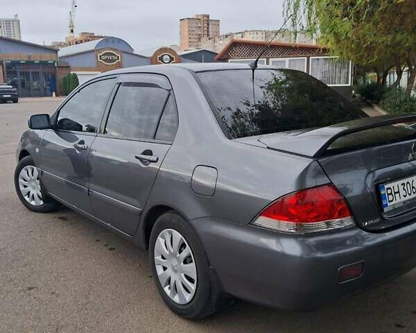 Сірий Міцубісі Lancer, об'ємом двигуна 1.6 л та пробігом 229 тис. км за 4900 $, фото 31 на Automoto.ua