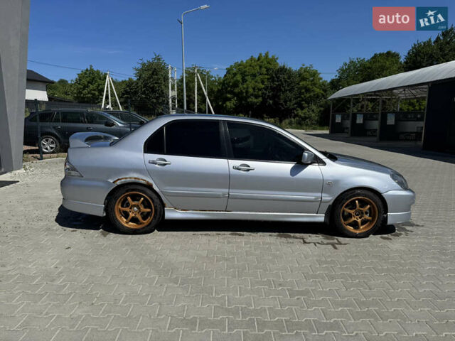 Мицубиси Лансер 2006 в Львове на Automoto.ua Серый Мицубиси Лансер, объемом двигателя 2 л и пробегом 272 тыс. км за 4999 $, фото 8 на Automoto.ua