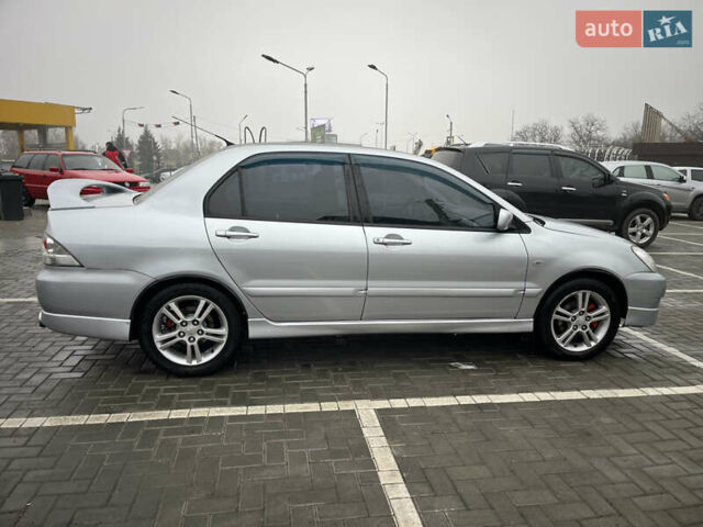 Сірий Міцубісі Lancer, об'ємом двигуна 2 л та пробігом 187 тис. км за 4500 $, фото 13 на Automoto.ua