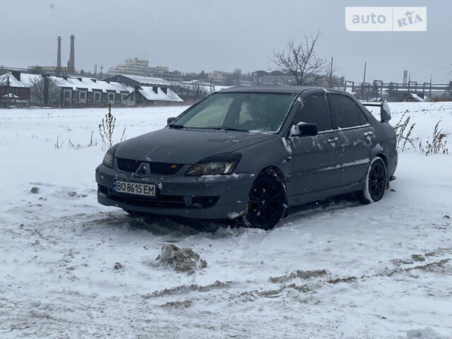 Сірий Міцубісі Lancer, об'ємом двигуна 1.58 л та пробігом 228 тис. км за 4300 $, фото 24 на Automoto.ua