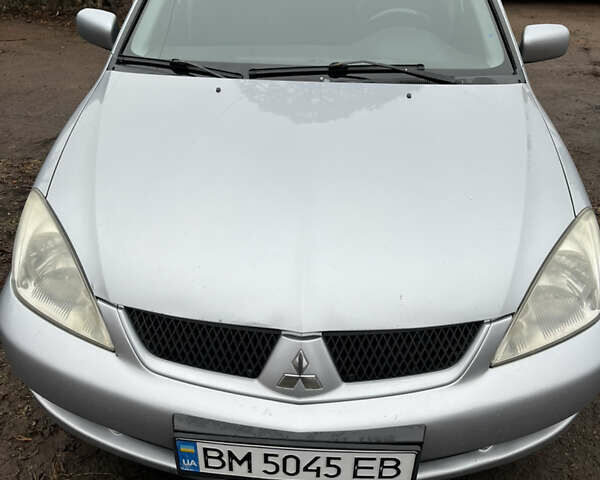 Сірий Міцубісі Lancer, об'ємом двигуна 1.58 л та пробігом 308 тис. км за 3700 $, фото 10 на Automoto.ua