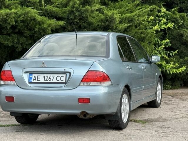 Серый Мицубиси Лансер, объемом двигателя 1.6 л и пробегом 220 тыс. км за 4400 $, фото 9 на Automoto.ua