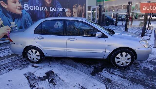Сірий Міцубісі Lancer, об'ємом двигуна 1.6 л та пробігом 163 тис. км за 5000 $, фото 25 на Automoto.ua