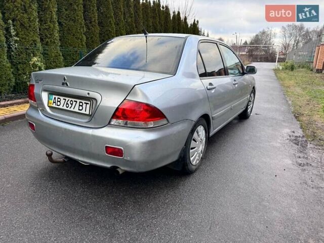 Сірий Міцубісі Lancer, об'ємом двигуна 1.58 л та пробігом 333 тис. км за 2750 $, фото 8 на Automoto.ua