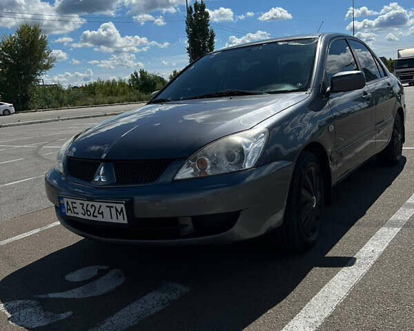 Сірий Міцубісі Lancer, об'ємом двигуна 1.6 л та пробігом 223 тис. км за 4500 $, фото 5 на Automoto.ua