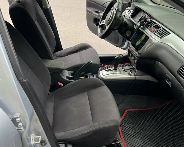 Сірий Міцубісі Lancer, об'ємом двигуна 2 л та пробігом 229 тис. км за 3800 $, фото 6 на Automoto.ua
