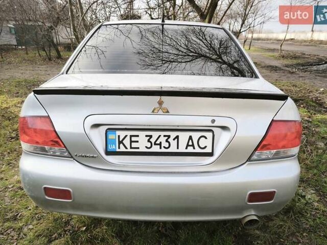 Серый Мицубиси Лансер, объемом двигателя 1.6 л и пробегом 234 тыс. км за 4300 $, фото 7 на Automoto.ua