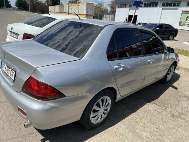 Міцубісі Lancer 2006 у Полтаві на Automoto.ua Сірий Міцубісі Lancer, об'ємом двигуна 1.6 л та пробігом 250 тис. км за 4500 $, фото 4 на Automoto.ua