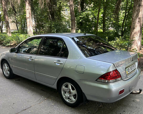 Сірий Міцубісі Lancer, об'ємом двигуна 1.6 л та пробігом 331 тис. км за 3100 $, фото 4 на Automoto.ua