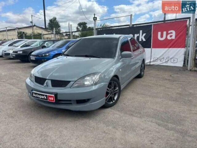 Сірий Міцубісі Lancer, об'ємом двигуна 2 л та пробігом 263 тис. км за 4300 $, фото 1 на Automoto.ua