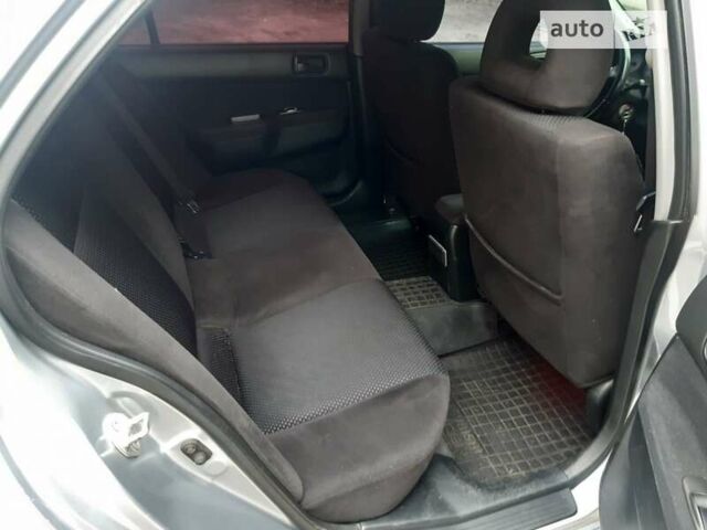 Сірий Міцубісі Lancer, об'ємом двигуна 1.58 л та пробігом 340 тис. км за 4000 $, фото 8 на Automoto.ua