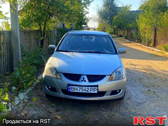 Сірий Міцубісі Lancer, об'ємом двигуна 1.6 л та пробігом 36 тис. км за 3500 $, фото 2 на Automoto.ua