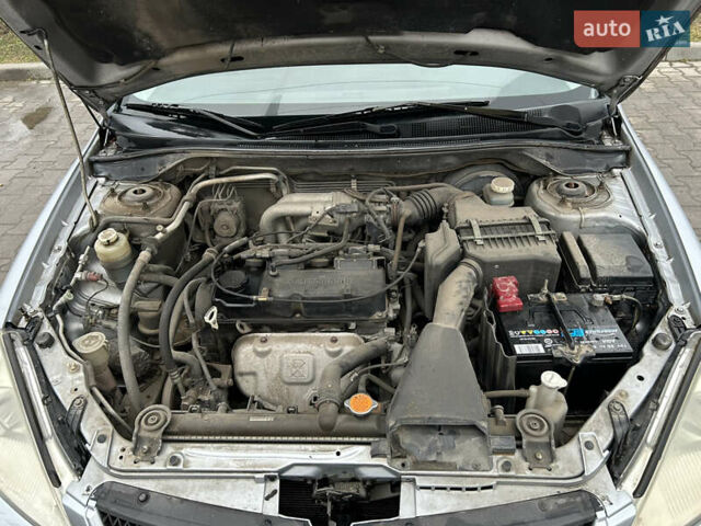 Сірий Міцубісі Lancer, об'ємом двигуна 1.6 л та пробігом 223 тис. км за 3900 $, фото 14 на Automoto.ua