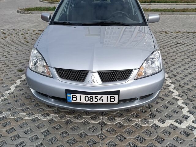 Сірий Міцубісі Lancer, об'ємом двигуна 1.6 л та пробігом 267 тис. км за 3600 $, фото 1 на Automoto.ua