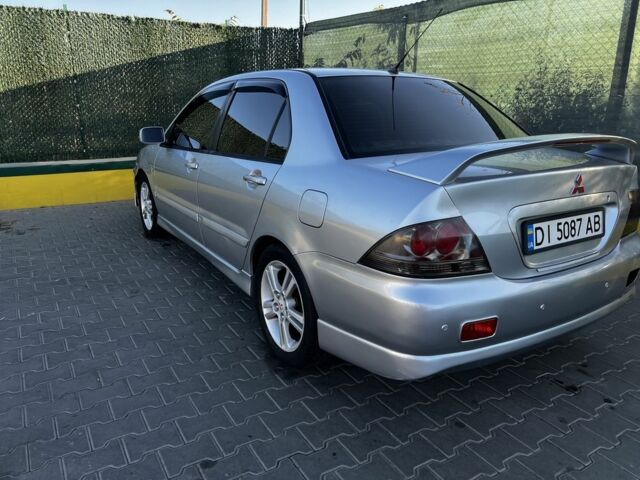 Сірий Міцубісі Lancer, об'ємом двигуна 2 л та пробігом 192 тис. км за 5400 $, фото 2 на Automoto.ua