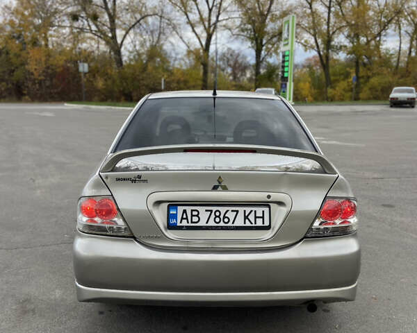 Мицубиси Лансер 2006 в Погребище на Automoto.ua Серый Мицубиси Лансер, объемом двигателя 2 л и пробегом 320 тыс. км за 3300 $, фото 7 на Automoto.ua