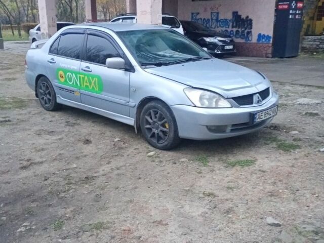 Сірий Міцубісі Lancer, об'ємом двигуна 1.6 л та пробігом 264 тис. км за 3200 $, фото 1 на Automoto.ua