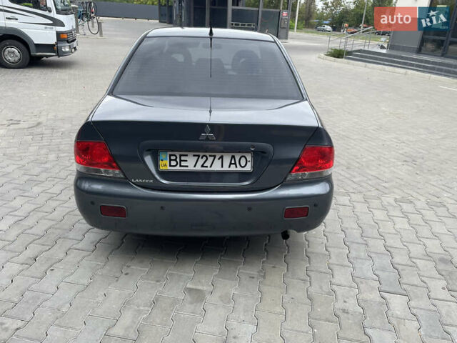 Сірий Міцубісі Lancer, об'ємом двигуна 1.58 л та пробігом 162 тис. км за 4650 $, фото 8 на Automoto.ua