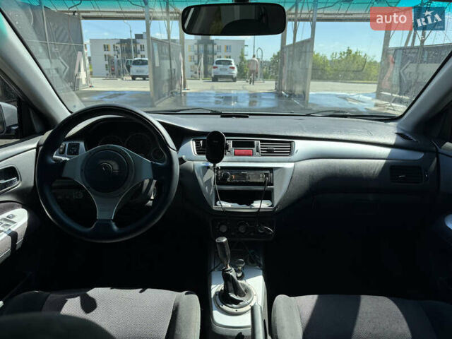 Мицубиси Лансер 2006 в Львове на Automoto.ua Серый Мицубиси Лансер, объемом двигателя 2 л и пробегом 272 тыс. км за 4999 $, фото 9 на Automoto.ua