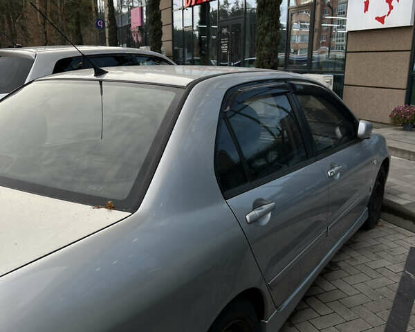 Серый Мицубиси Лансер, объемом двигателя 1.6 л и пробегом 310 тыс. км за 3500 $, фото 8 на Automoto.ua