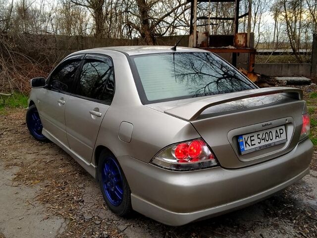 Серый Мицубиси Лансер, объемом двигателя 20 л и пробегом 360 тыс. км за 5500 $, фото 3 на Automoto.ua